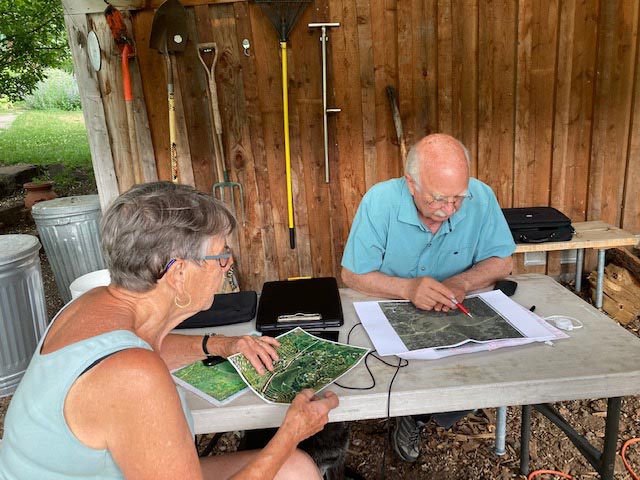 Suzanne Willow and Jack Goodnoe work on developing burial ground master plan